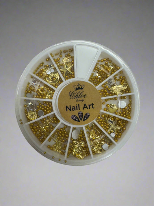 Golden Beads and Assorted Nail Decor in Organized Container